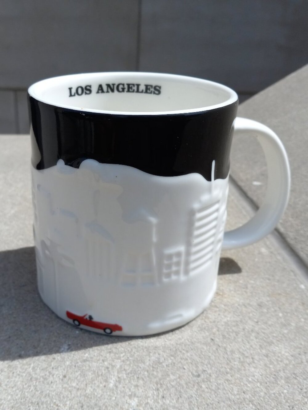 Starbucks Los Angeles Oversized Mug Embossed White Skyline on Black Ground 16 oz